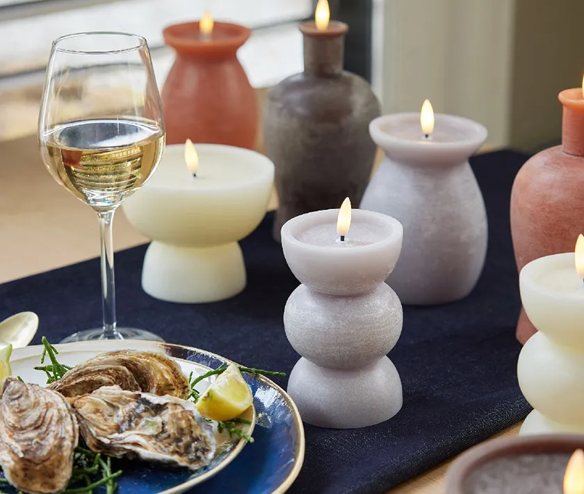 selection of led candles on table